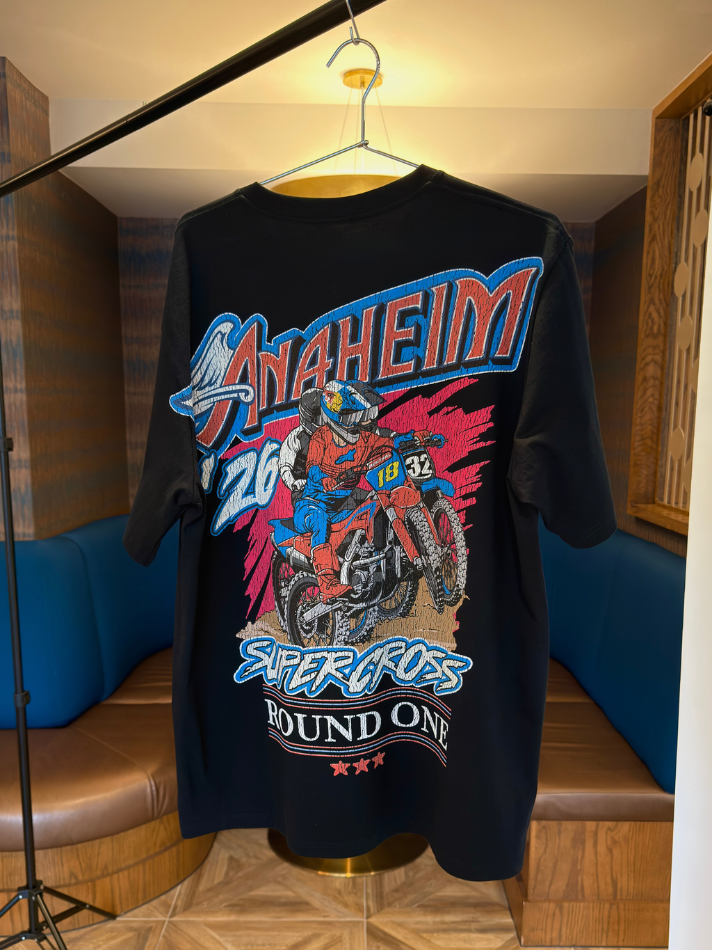 Black color Jett Lawrence supercross racing shirt.