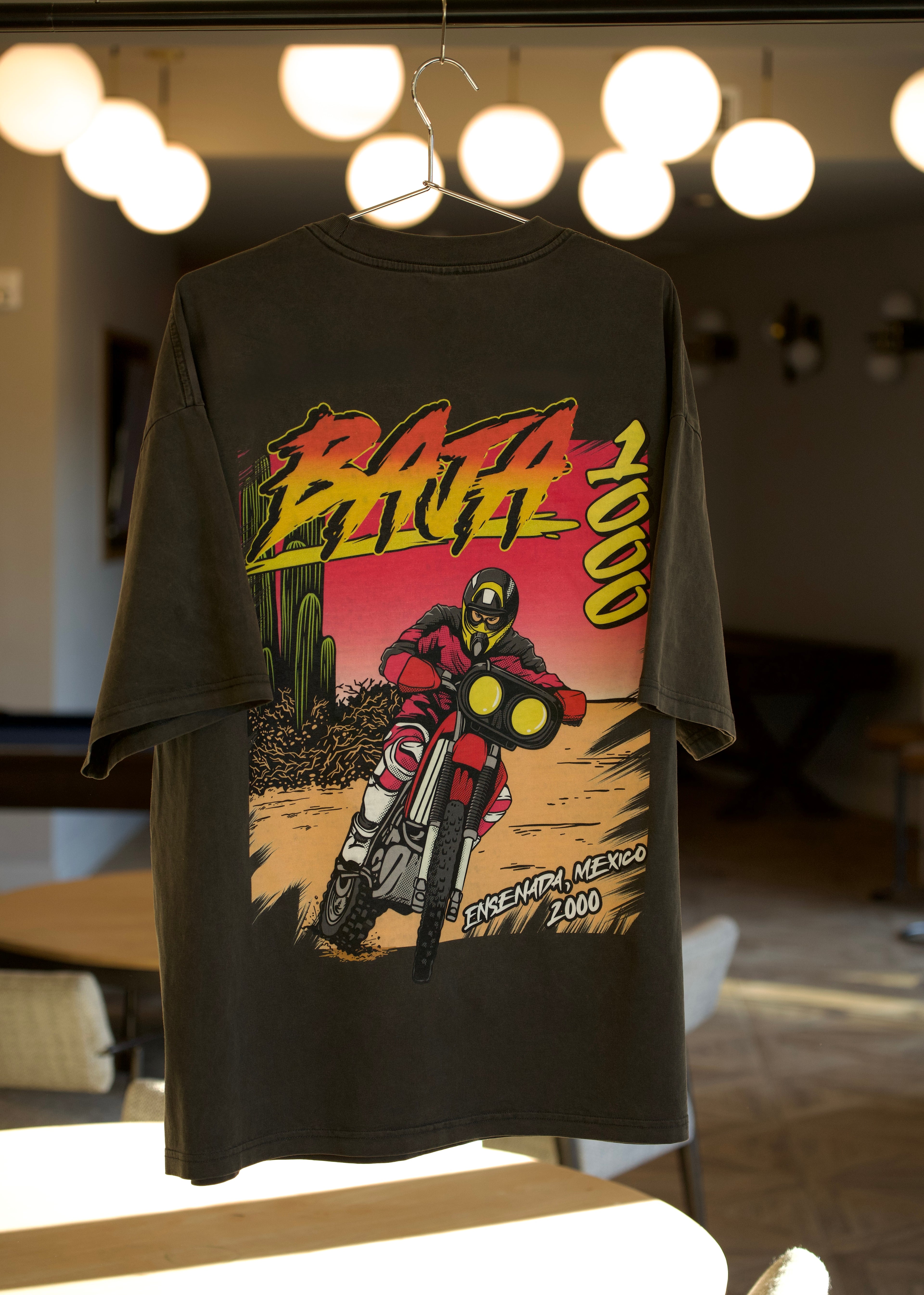 A baja 1000 shirt with Johnny Campbell on a Honda dirtbike.