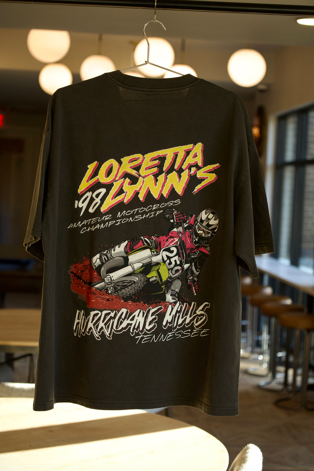 Vintage motocross shirt showing James Stewart on a Kawasaki.