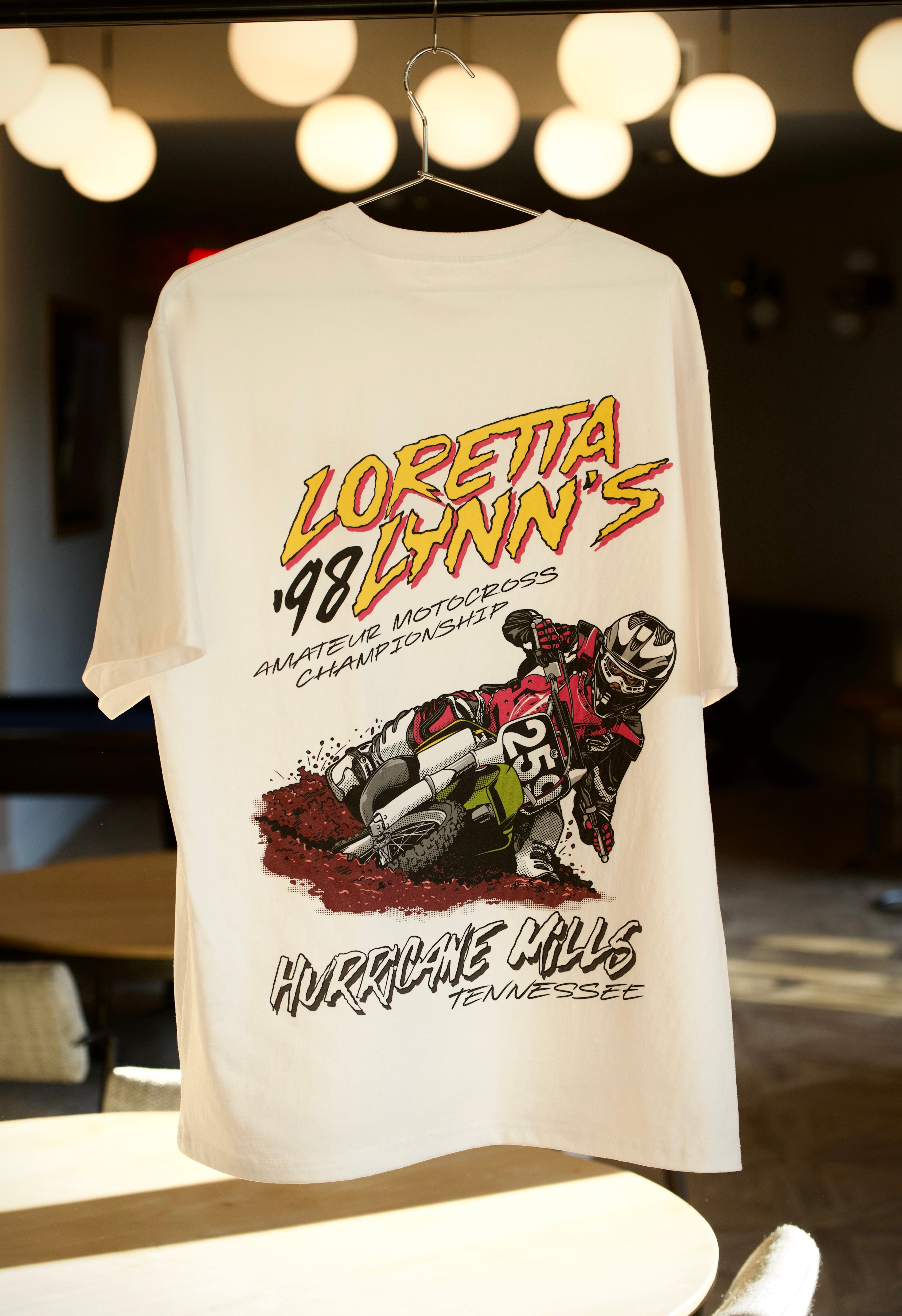Retro style James Stewart Loretta Lynn's motocross racing shirt.